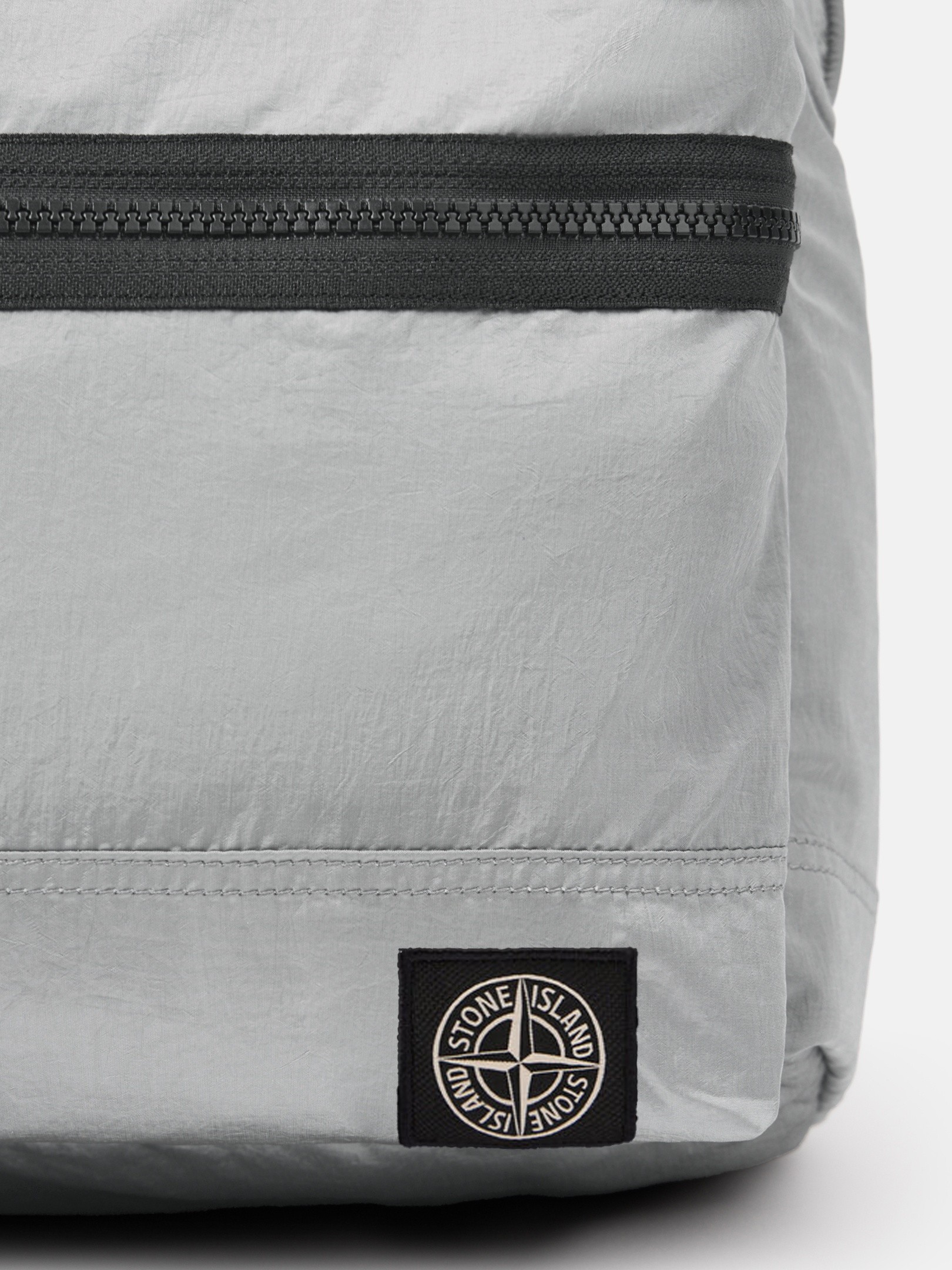 Pearl Grey Backpack with front pocket and adjustable padded straps